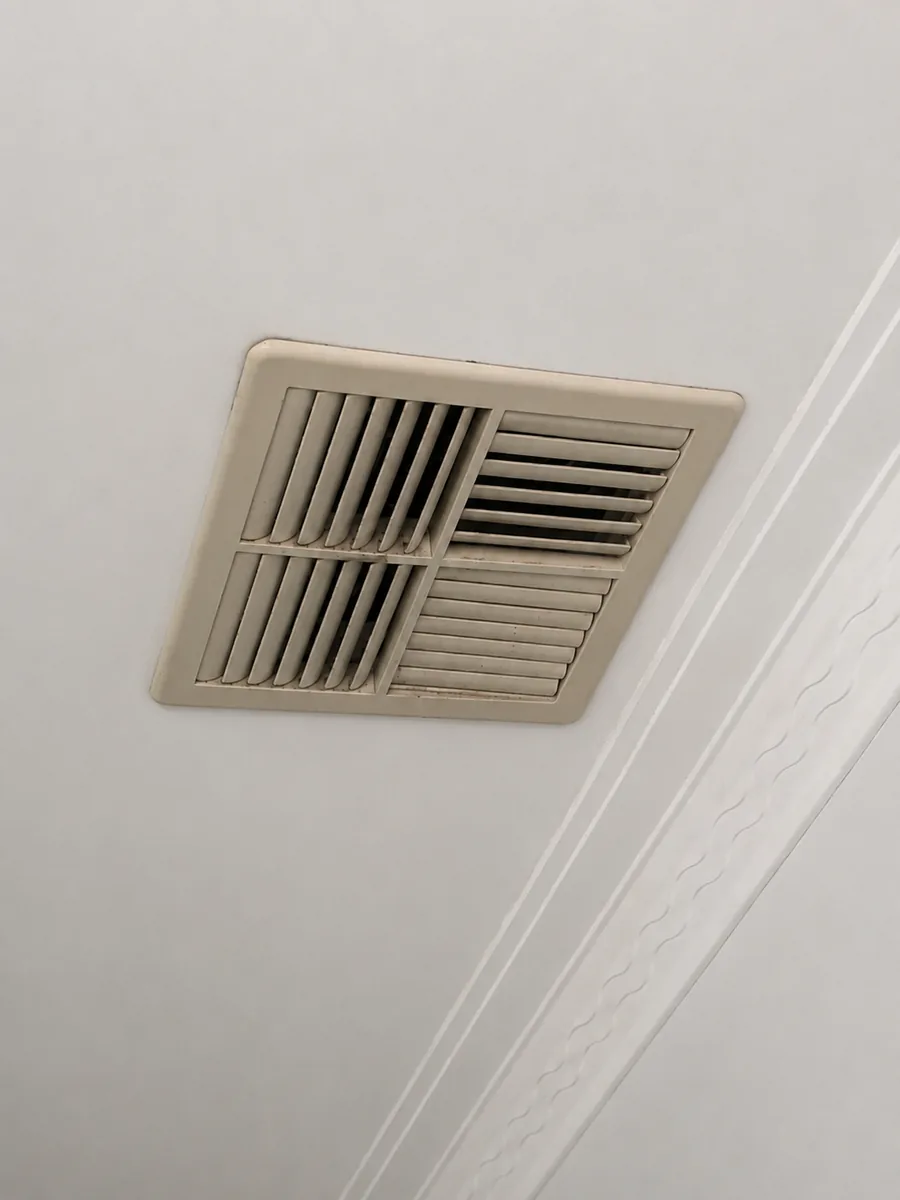 Open evaporative cooling ceiling vent before a cover is fitted